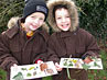 Two boys with leaves